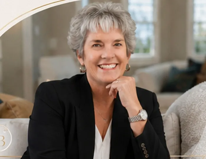 Kristen Boano seated in a bright living room